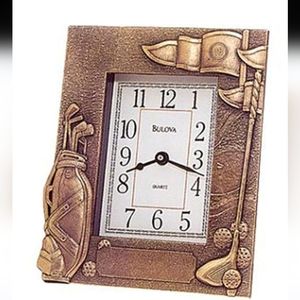 Metal golf desk clock Bulova works. 7"H